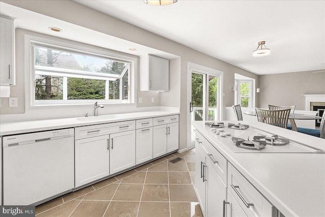 5342 Saint James Pl, Frederick, MD 21703 - kitchen with light countertops, a sink, white cabinetry, and white appliances