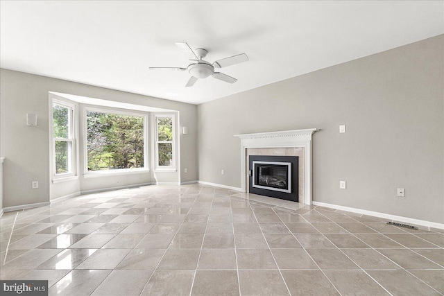 5342 Saint James Pl, Frederick, MD 21703 - unfurnished living room featuring visible vents, a high end fireplace, baseboards, light tile patterned flooring, and a ceiling fan