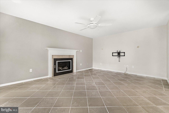 5342 Saint James Pl, Frederick, MD 21703 - unfurnished living room with a glass covered fireplace, ceiling fan, tile patterned flooring, and baseboards