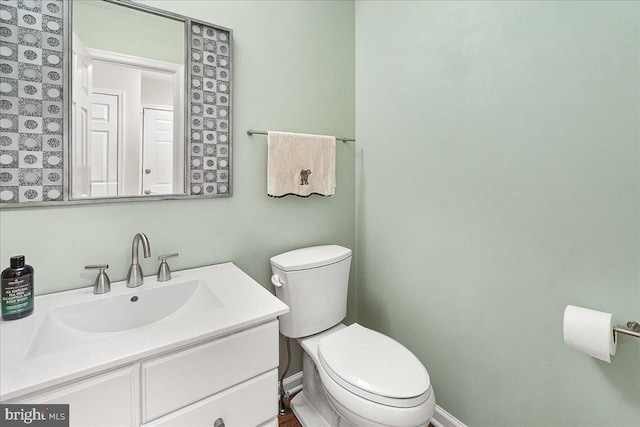 5342 Saint James Pl, Frederick, MD 21703 - bathroom featuring vanity, toilet, and baseboards