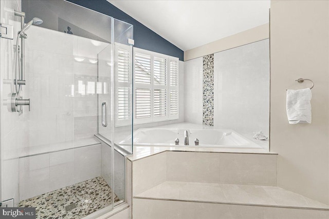 5342 Saint James Pl, Frederick, MD 21703 - bathroom with lofted ceiling, a garden tub, and a stall shower