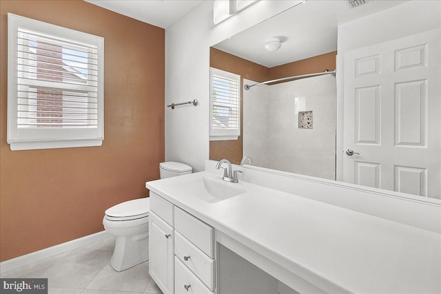 5342 Saint James Pl, Frederick, MD 21703 - full bath with tile patterned flooring, toilet, vanity, baseboards, and a shower