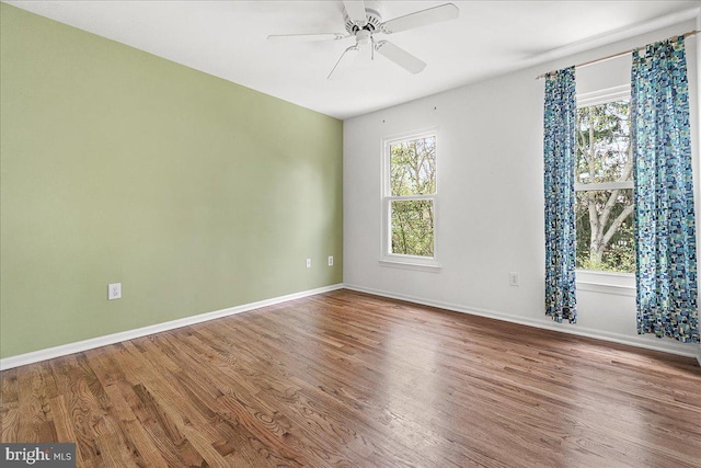 5342 Saint James Pl, Frederick, MD 21703 - empty room with wood finished floors, a ceiling fan, and baseboards