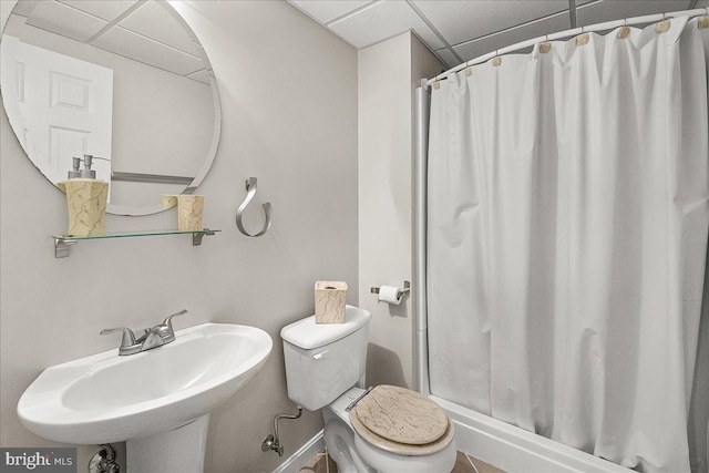 5342 Saint James Pl, Frederick, MD 21703 - full bathroom with a shower stall, toilet, a sink, baseboards, and a paneled ceiling