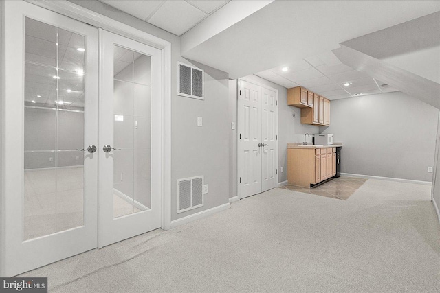 5342 Saint James Pl, Frederick, MD 21703 - interior space featuring light colored carpet, visible vents, french doors, and baseboards