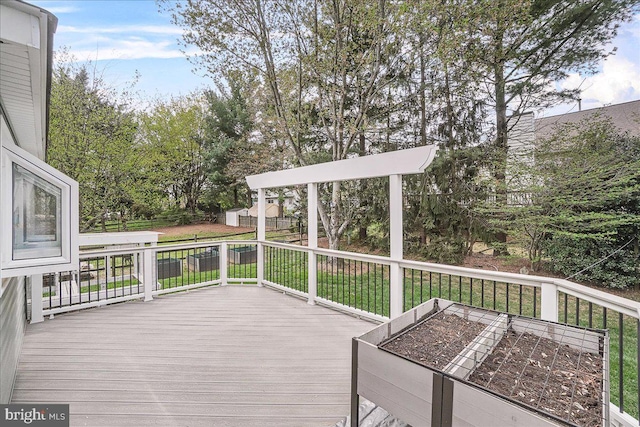 5342 Saint James Pl, Frederick, MD 21703 - deck with a lawn, a vegetable garden, and a fenced backyard