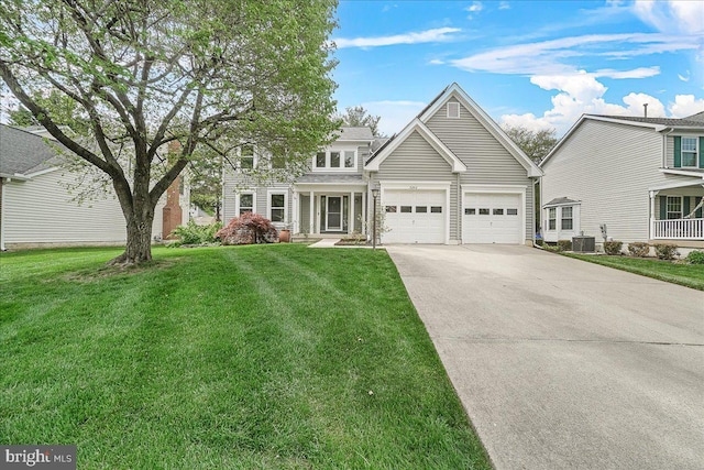 5342 Saint James Pl, Frederick, MD 21703 - view of front of property with cooling unit, concrete driveway, a front yard, and an attached garage