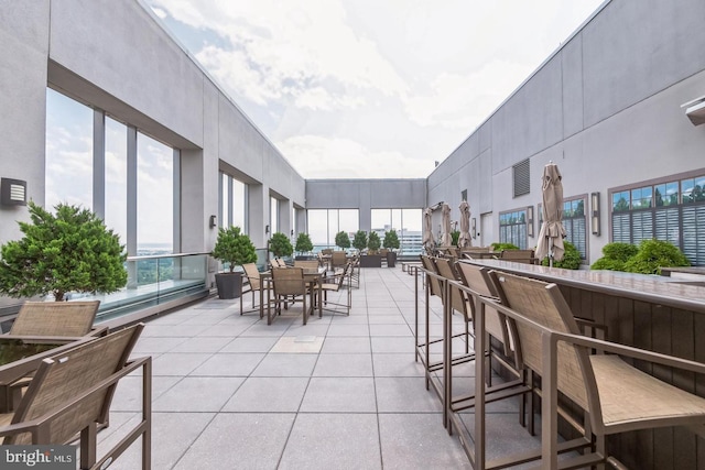 1111 19th St N Unit 1804, Arlington, VA 22209 - view of patio featuring outdoor dry bar