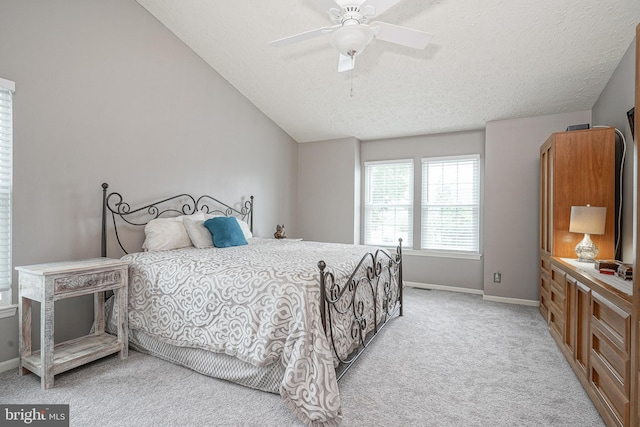 619 Walden Way, Lumberton, NJ 08048 - bedroom with light colored carpet, baseboards, vaulted ceiling, a textured ceiling, and ceiling fan