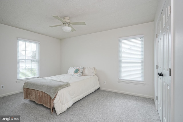 619 Walden Way, Lumberton, NJ 08048 - bedroom with baseboards, carpet, a textured ceiling, and a ceiling fan