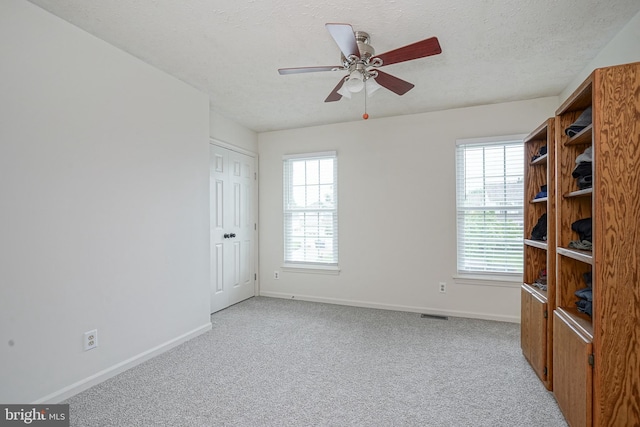 619 Walden Way, Lumberton, NJ 08048 - spare room featuring baseboards, carpet, a ceiling fan, and a textured ceiling