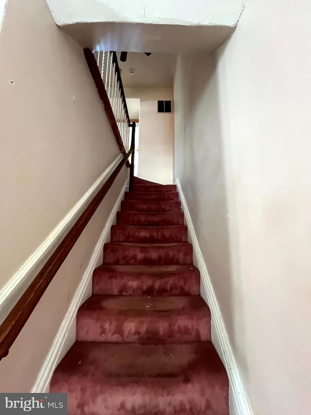 721 Tuckerman St NW, Washington, DC 20011 - stairway with visible vents and carpet