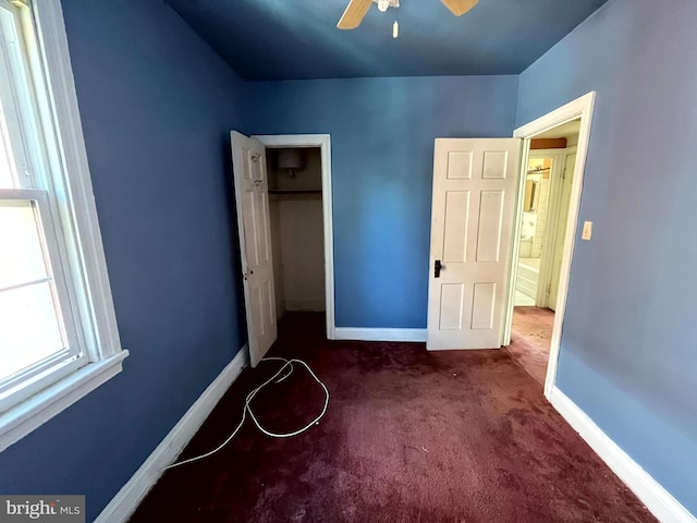 721 Tuckerman St NW, Washington, DC 20011 - unfurnished bedroom featuring a closet, carpet flooring, ceiling fan, and baseboards