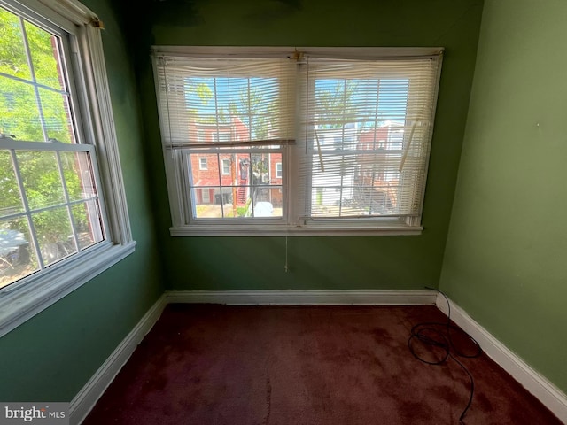 721 Tuckerman St NW, Washington, DC 20011 - spare room featuring baseboards and carpet flooring