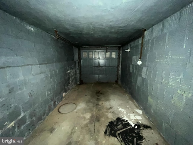 721 Tuckerman St NW, Washington, DC 20011 - basement with concrete block wall and a garage