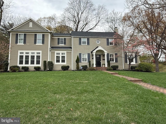 221 Williamsburg Dr, Silver Spring, MD 20901 - view of front of property with a chimney and a front yard