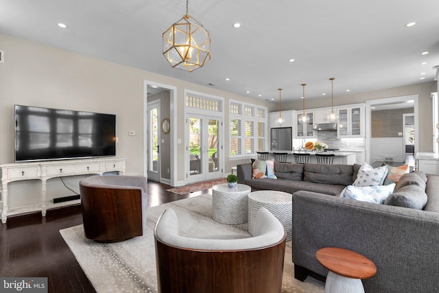 221 Williamsburg Dr, Silver Spring, MD 20901 - living room featuring dark wood finished floors, a notable chandelier, and recessed lighting