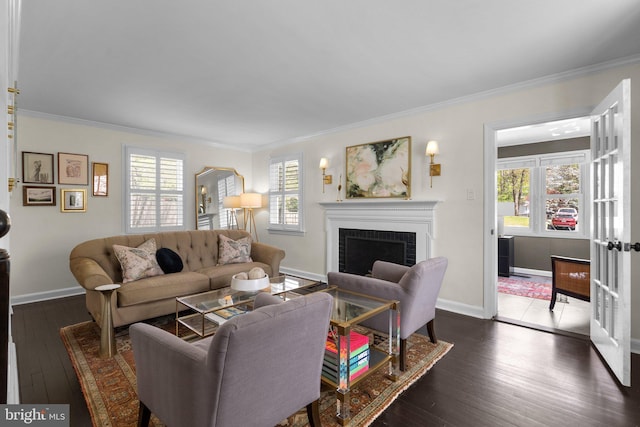 221 Williamsburg Dr, Silver Spring, MD 20901 - living area with baseboards, crown molding, dark wood-type flooring, and a fireplace