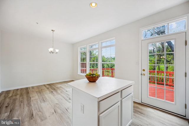 13416 Ansel Ter, Germantown, MD 20874 - doorway featuring baseboards, a chandelier, and light wood-style floors