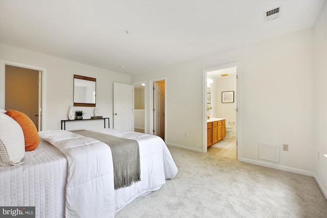 13416 Ansel Ter, Germantown, MD 20874 - bedroom featuring light colored carpet, baseboards, visible vents, and ensuite bathroom