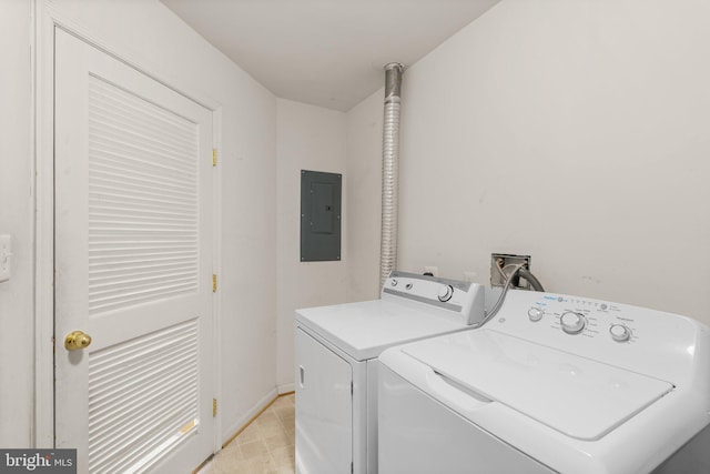 laundry area featuring laundry area, separate washer and dryer, and electric panel