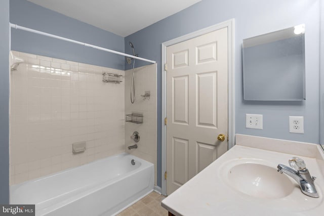 bathroom with vanity and shower / bathtub combination
