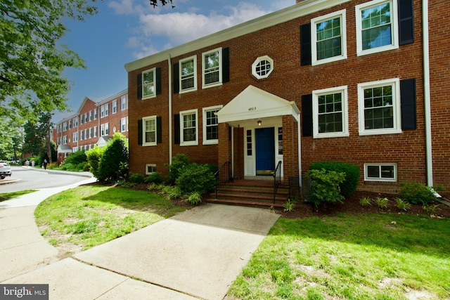 4803 30th St S Unit A2, Arlington, VA 22206 - townhome / multi-family property featuring brick siding and a front yard