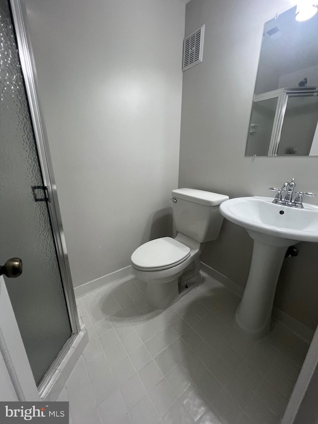 4803 30th St S Unit A2, Arlington, VA 22206 - bathroom featuring a shower stall and tile patterned floors
