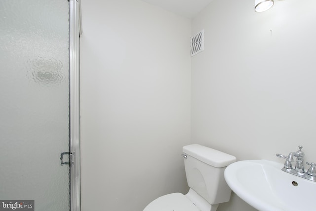 4803 30th St S Unit A2, Arlington, VA 22206 - bathroom with a sink and a shower with shower door