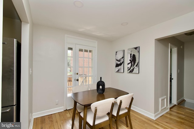 4803 30th St S Unit A2, Arlington, VA 22206 - dining room featuring light wood-style flooring and french doors