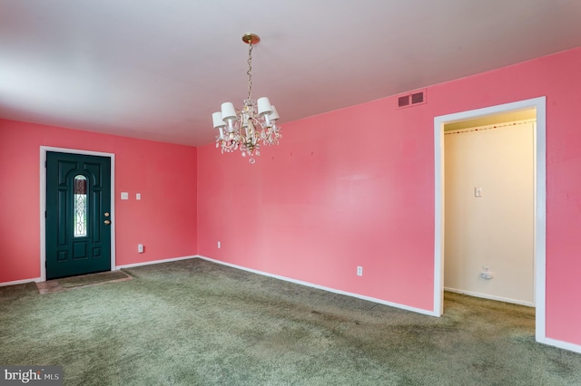interior space featuring baseboards, a notable chandelier, and visible vents