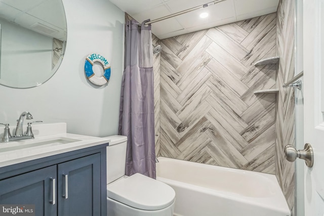 full bathroom with shower / bath combination with curtain, toilet, and vanity