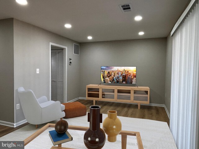 exercise area featuring recessed lighting, visible vents, and baseboards