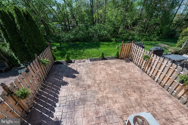 view of patio / terrace with fence