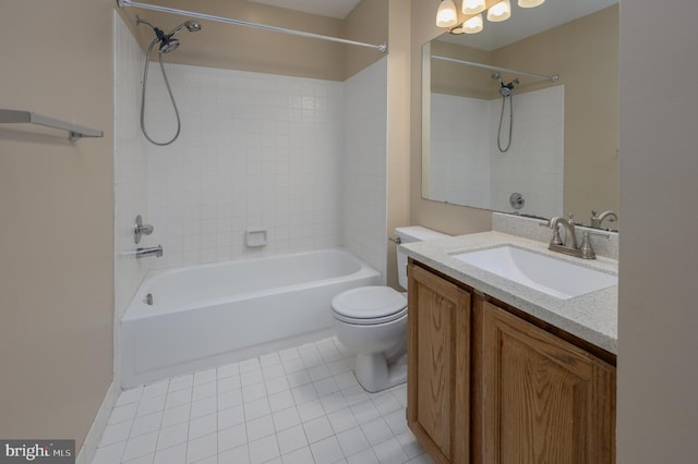 full bath with vanity, washtub / shower combination, tile patterned floors, and toilet
