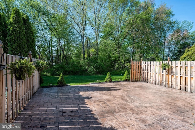 view of patio featuring fence