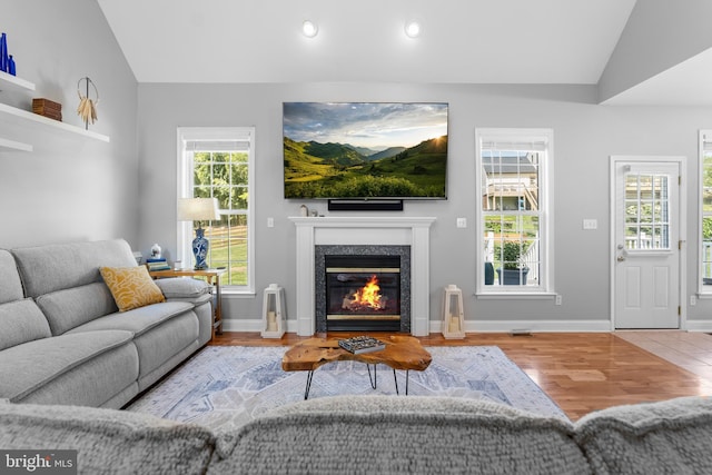 145 Rolling Ave, North East, MD 21901 - living area with lofted ceiling, a premium fireplace, wood finished floors, recessed lighting, and baseboards