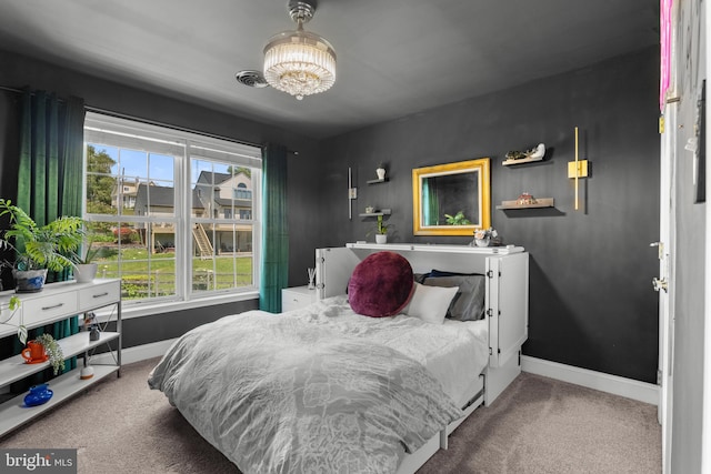 145 Rolling Ave, North East, MD 21901 - carpeted bedroom featuring baseboards and a chandelier