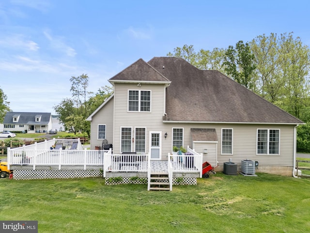 145 Rolling Ave, North East, MD 21901 - rear view of property with central AC unit, a lawn, a wooden deck, and roof with shingles