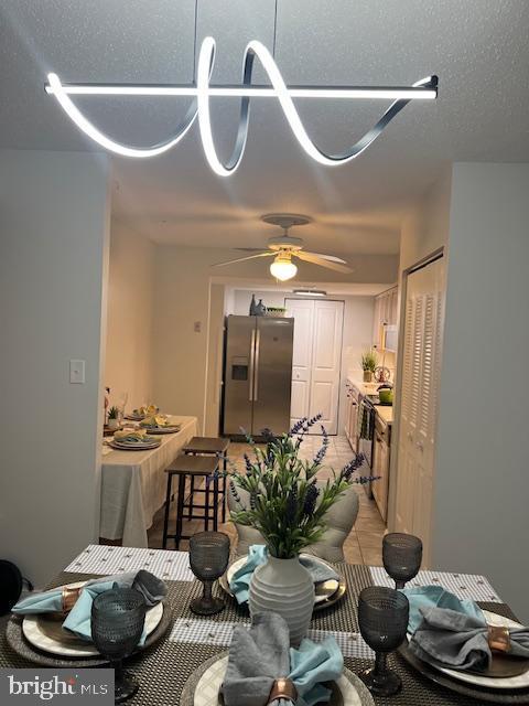 dining room featuring a ceiling fan