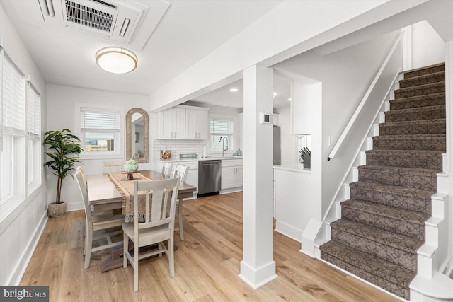 12353 Meadow Dr, Berlin, MD 21811 - dining area featuring baseboards, recessed lighting, stairs, light wood-style floors, and visible vents