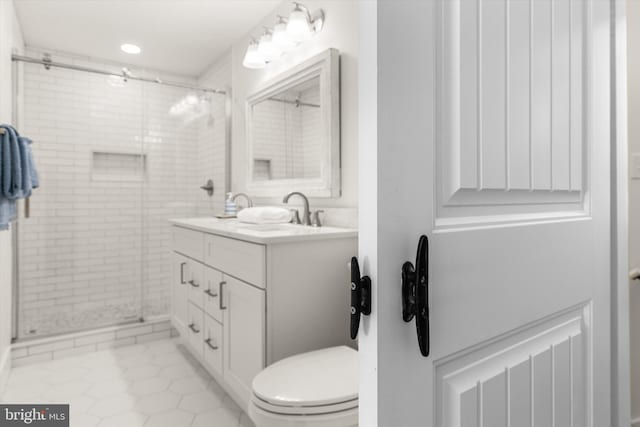 12353 Meadow Dr, Berlin, MD 21811 - full bathroom with vanity, recessed lighting, toilet, a stall shower, and tile patterned floors