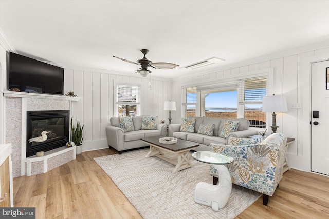 12353 Meadow Dr, Berlin, MD 21811 - living area featuring a ceiling fan, ornamental molding, and wood finished floors