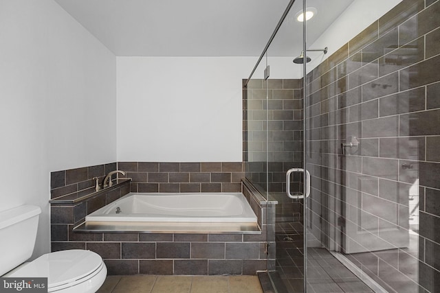 929 S 2nd St, Philadelphia, PA 19147 - bathroom with toilet, a garden tub, a shower stall, and tile patterned flooring