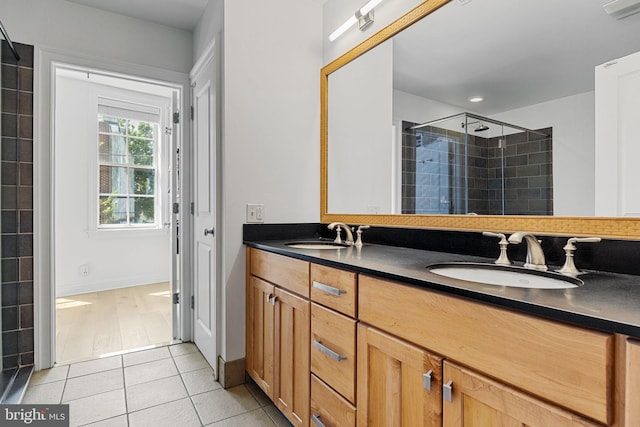 929 S 2nd St, Philadelphia, PA 19147 - full bath featuring a stall shower, double vanity, and tile patterned flooring