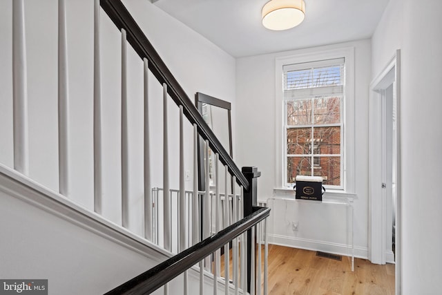 929 S 2nd St, Philadelphia, PA 19147 - entryway with light wood-style flooring, stairs, and baseboards