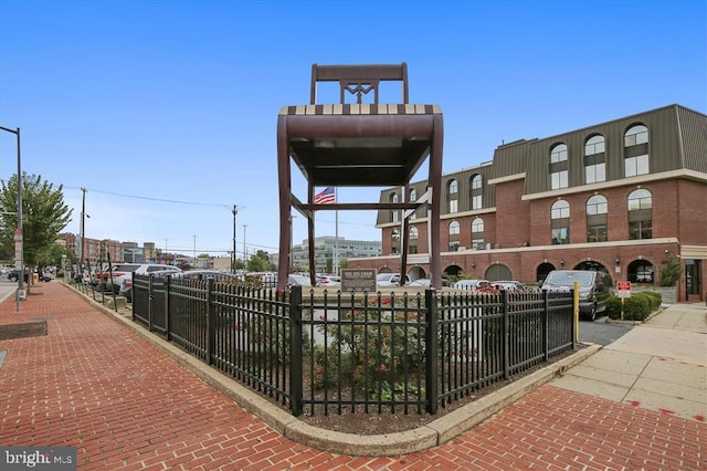 view of property's community featuring fence private yard