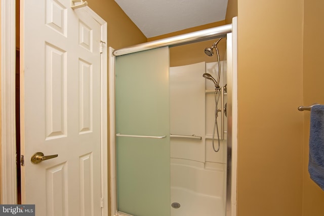 bathroom with a stall shower
