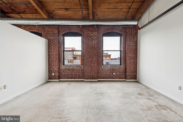 1714 Memphis St Unit 402, Philadelphia, PA 19125 - unfurnished room with concrete flooring, baseboards, and brick wall