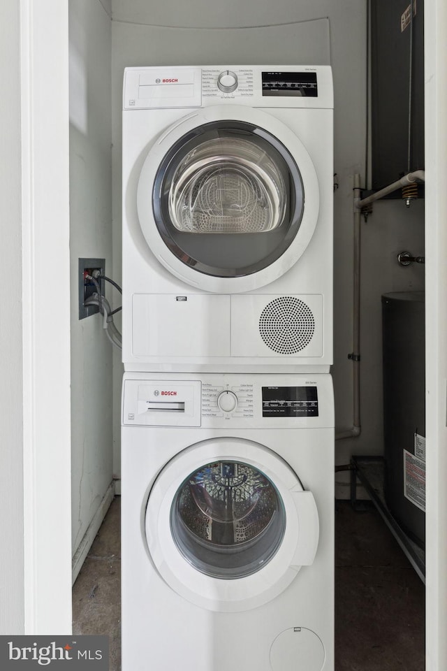 1714 Memphis St Unit 402, Philadelphia, PA 19125 - laundry area featuring stacked washer / dryer, laundry area, and baseboards